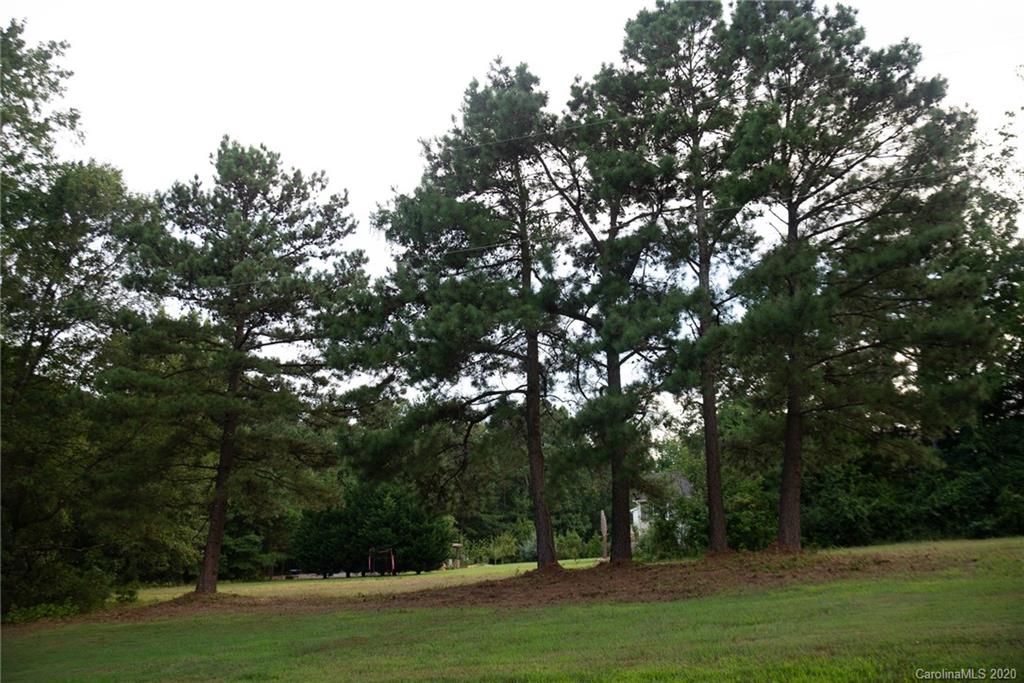 0 Niven Road, Unit LOT 5 Lancaster, SC 29720 - Photo 2 of 7 a view of outdoor space with green field and trees