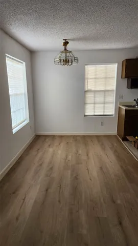 an empty room with windows