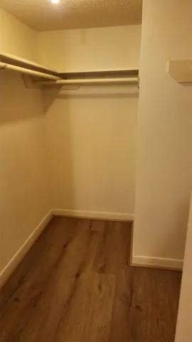 a view of a room with racks on the wall