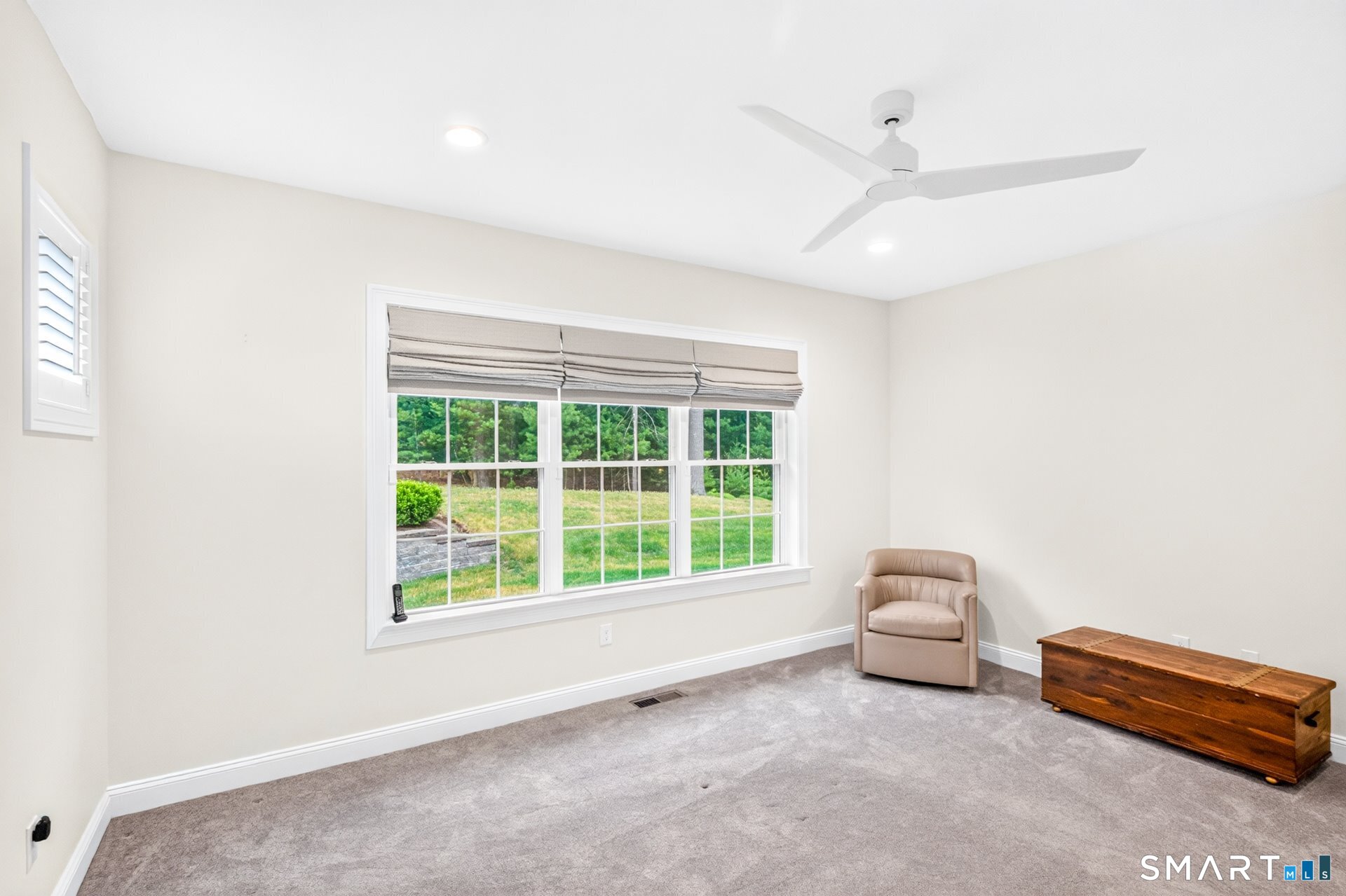 6 Prospect Ridge, Unit 6 Simsbury, CT 06070 - Photo 18 of 33 Primary bedroom suite has a lot of natural light