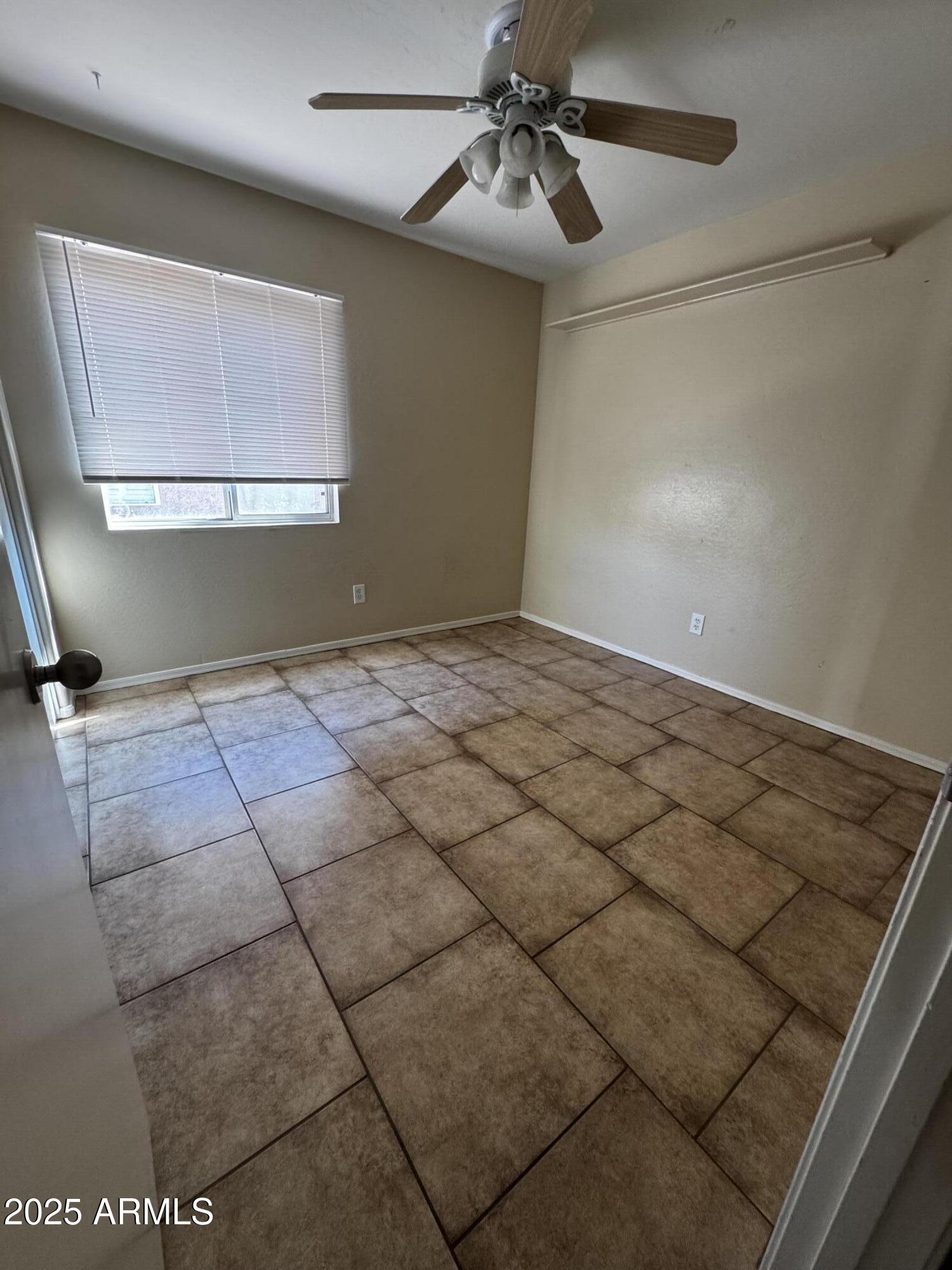 12817 North El Frio Street El Mirage, AZ 85335 - Photo 11 of 16 a view of an empty room