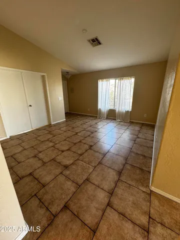 a view of a livingroom with a staircase