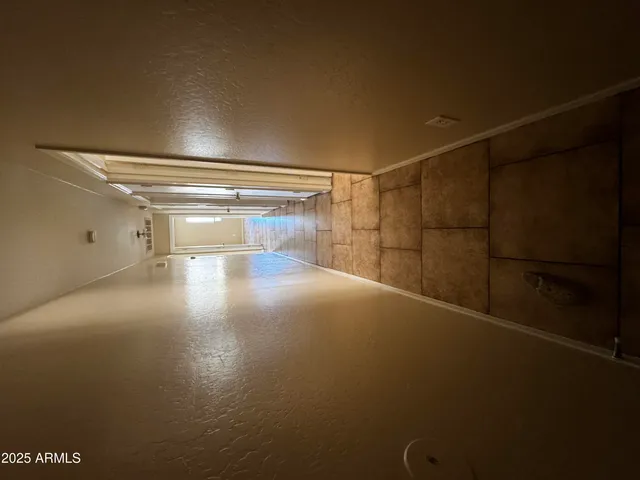 a view of a room with racks on the wall