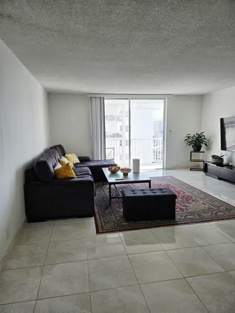 a living room with a couch and a table