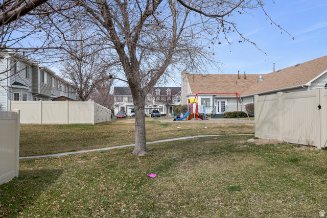 962 Independence Avenue Provo, UT 84604 - Photo 24 of 31 View of yard with a playground and a residential view