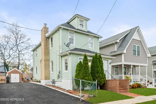a front view of a building with street view
