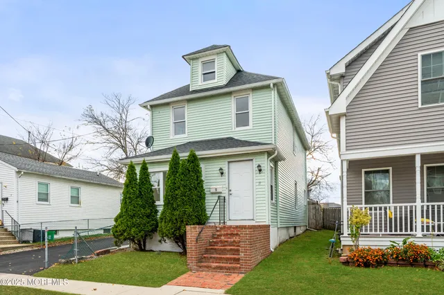 a house view with a garden space