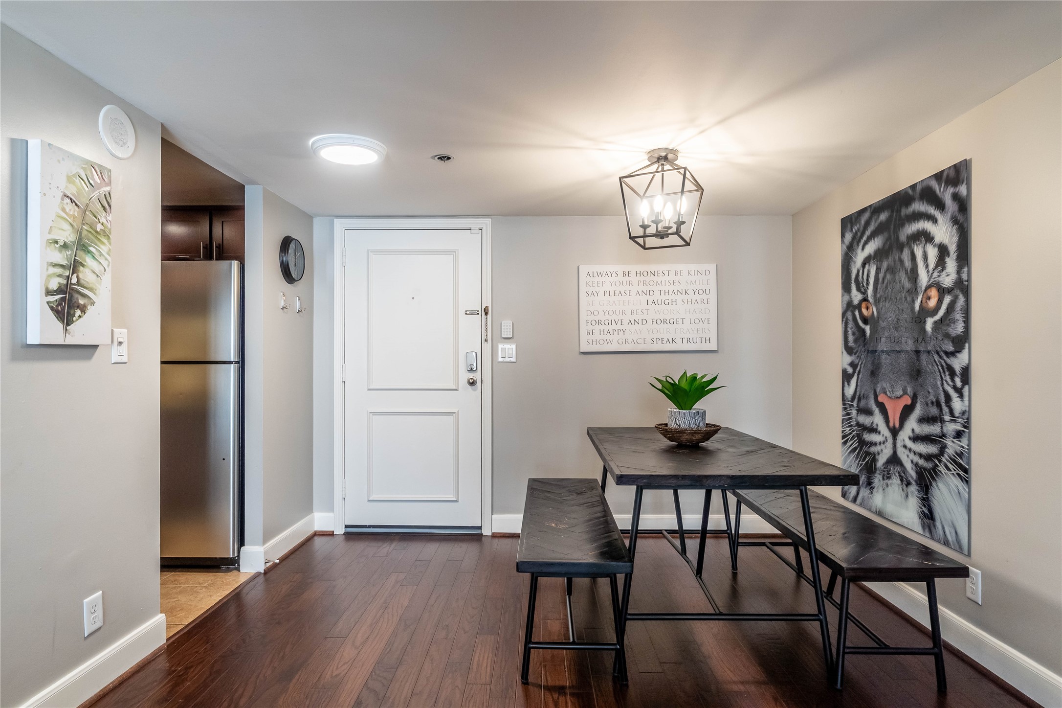 3525 Sage Road, Unit 1313 Houston, TX 77056 - Photo 3 of 18 a view of a dining room with furniture window and wooden floor