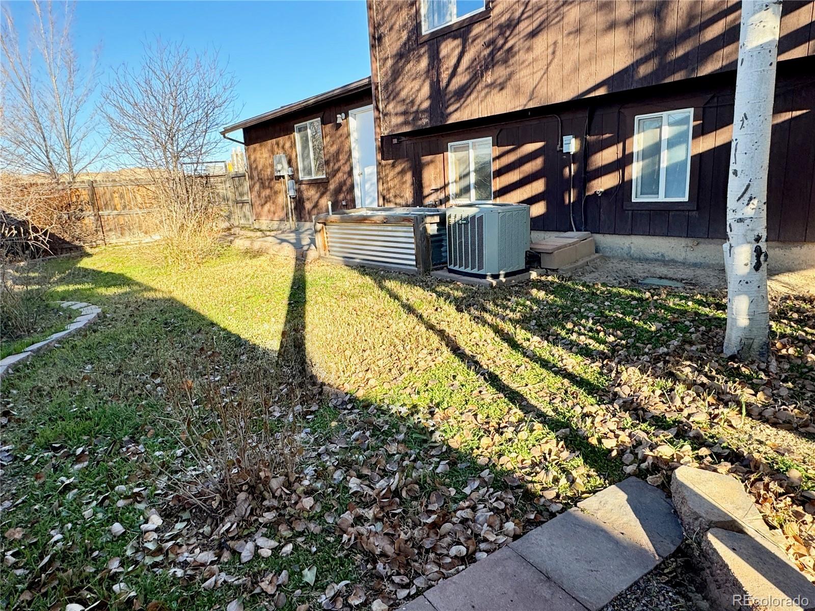 401 Rider Road Rangely, CO 81648 - Photo 23 of 23 a view of a house with a yard