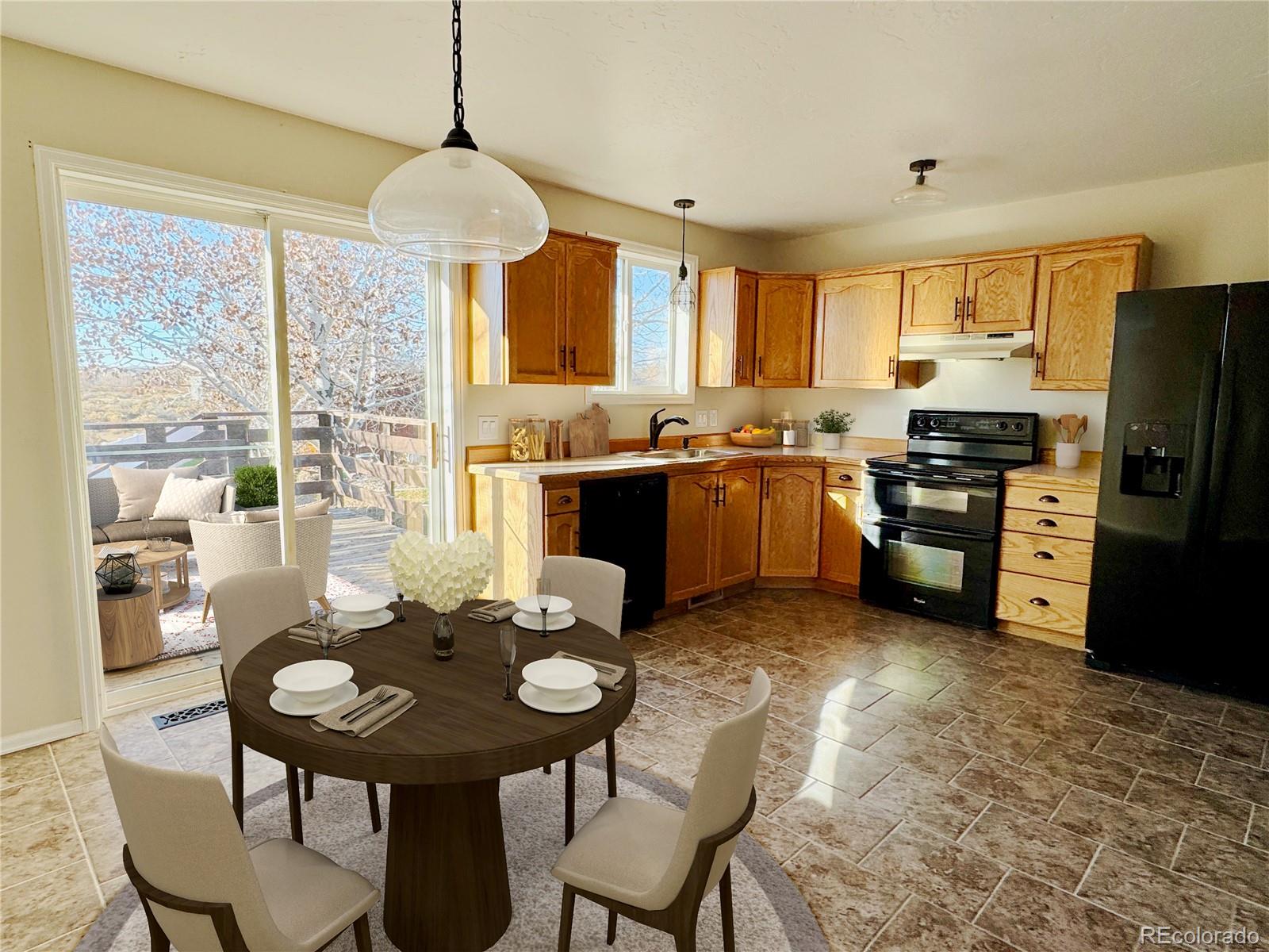 401 Rider Road Rangely, CO 81648 - Photo 3 of 23 a kitchen with kitchen island granite countertop a stove a sink a refrigerator dining table and chairs
