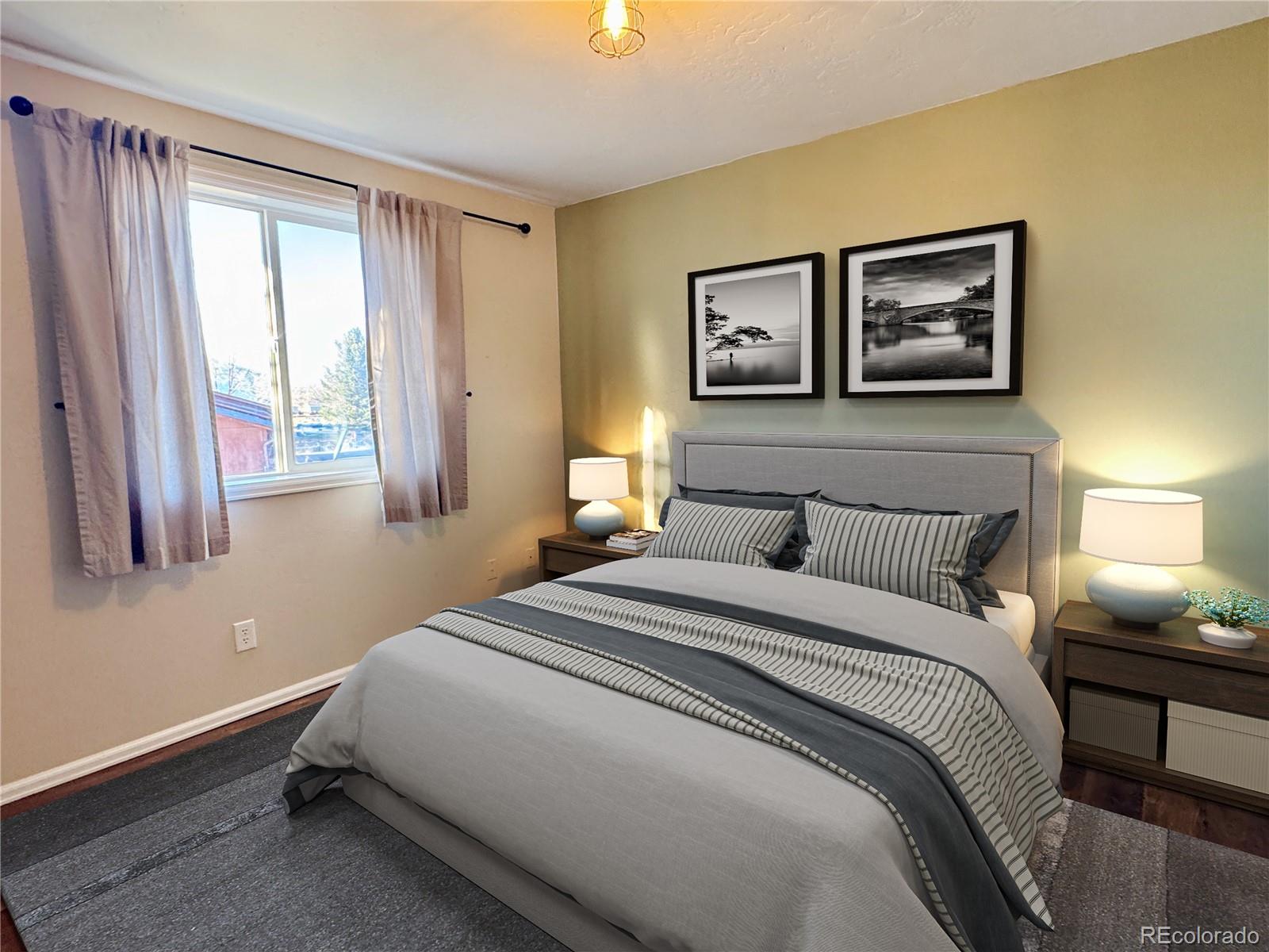 401 Rider Road Rangely, CO 81648 - Photo 4 of 23 a bedroom with a bed and a window