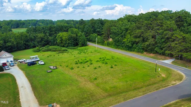 a view of a pool with a yard