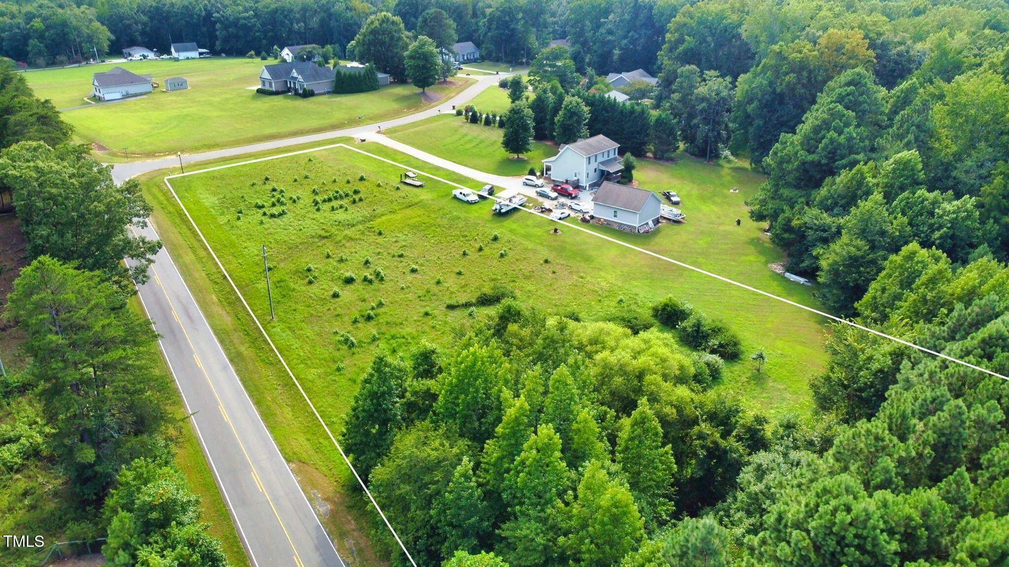 0 Weaver Ridge Road Rougemont, NC 27572 - Photo 5 of 15 a view of a garden with an outdoor seating