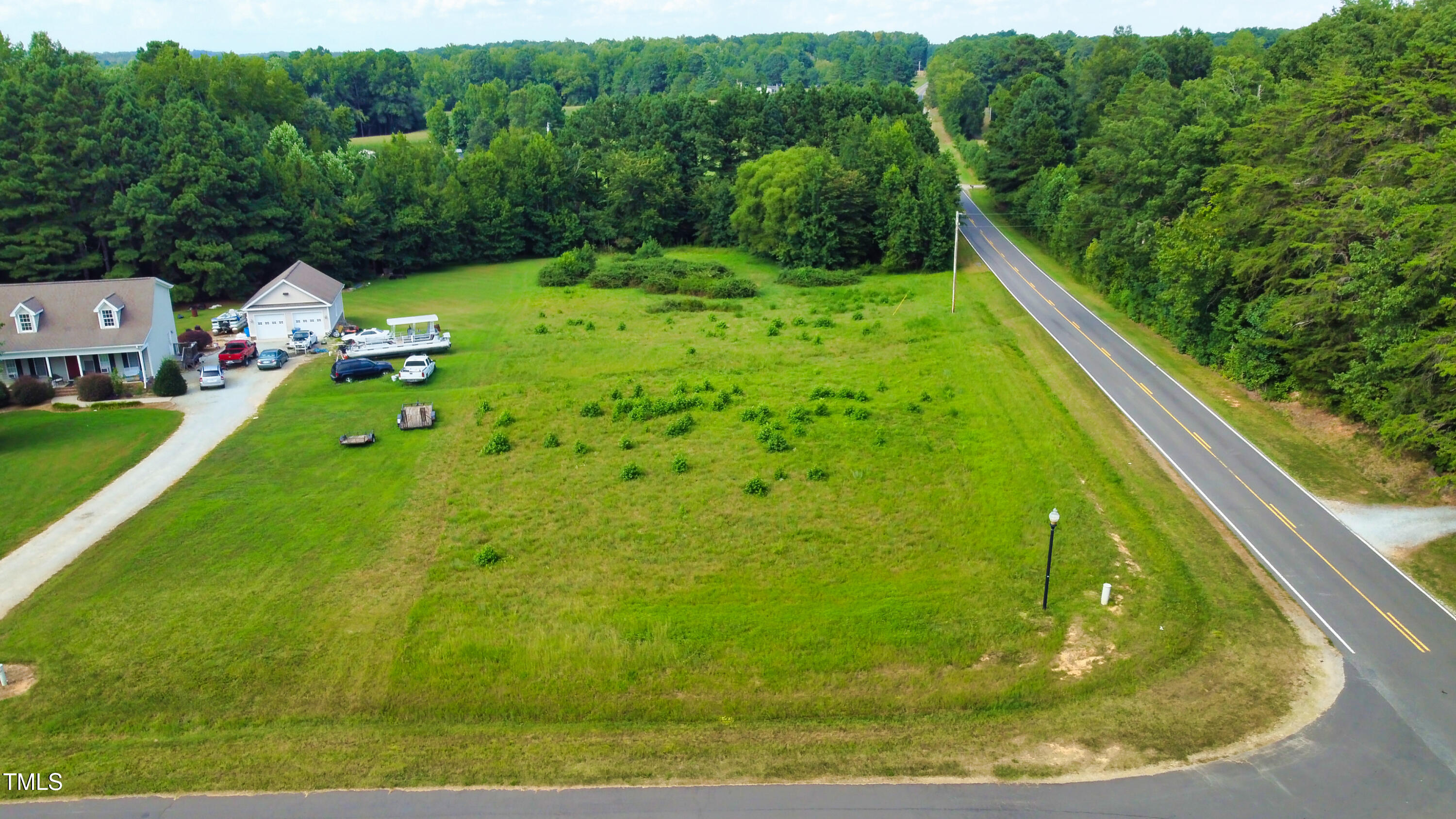 0 Weaver Ridge Road Rougemont, NC 27572 - Photo 10 of 15 a view of a back yard from a balcony