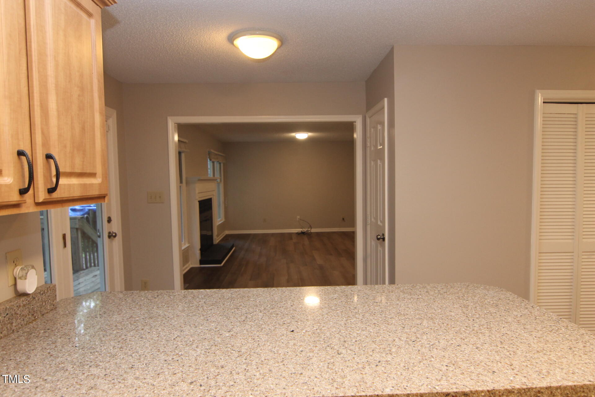 3313 Singleleaf Lane Raleigh, NC 27616 - Photo 11 of 25 View from Kitchen into Den