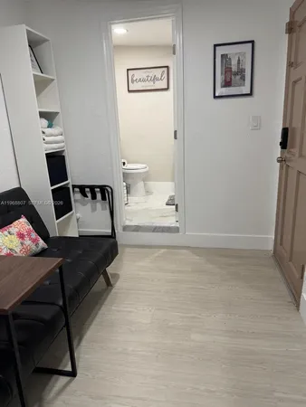 a view of a hallway with workspace