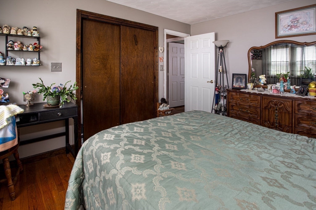 166 Stonehaven Road Fall River, MA 02723 - Photo 18 of 33 a bedroom with a bed and a dresser