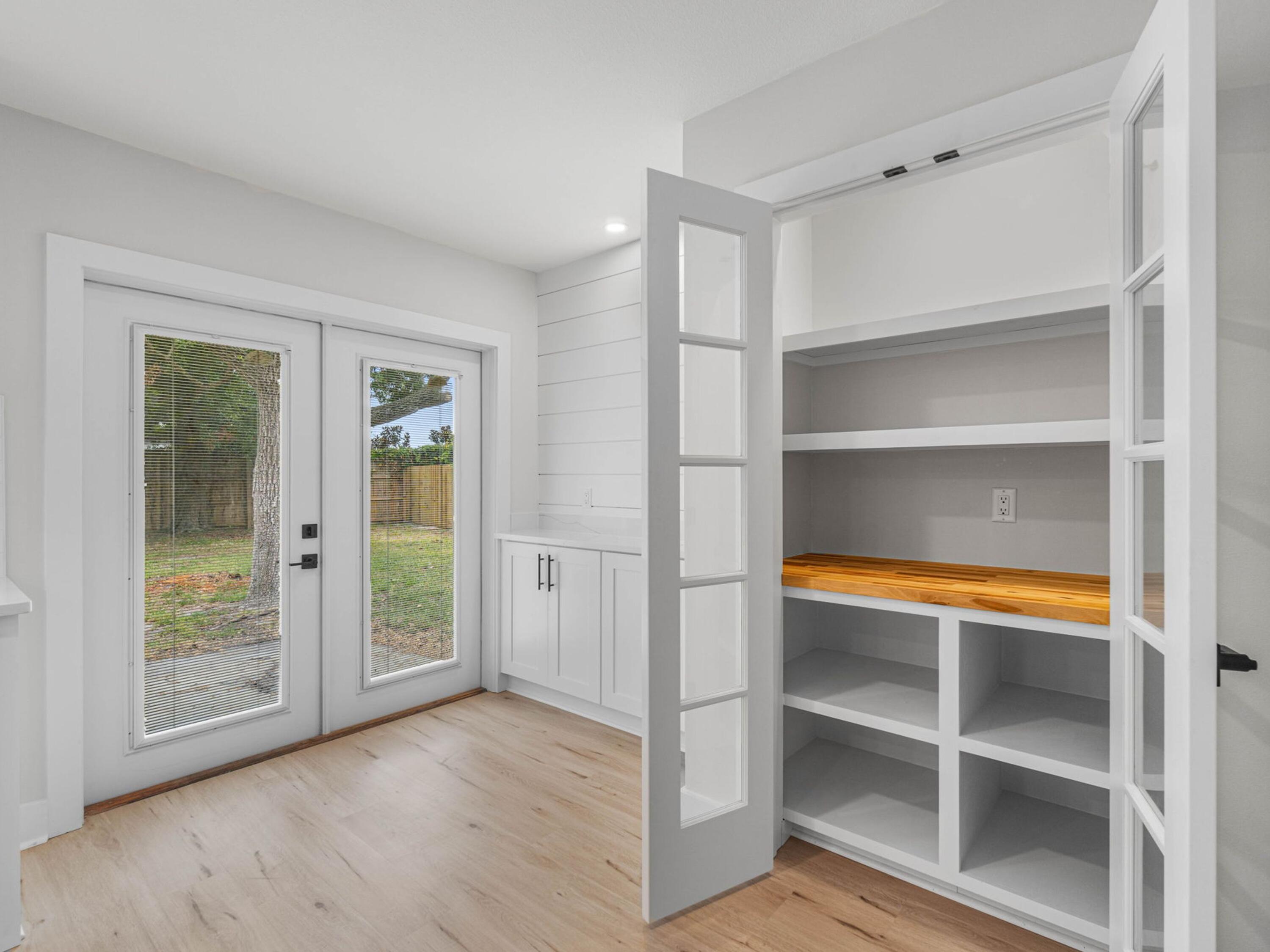 609 Sea View Circle Destin, FL 32541 - Photo 21 of 45 a view of walk in closet with empty racks