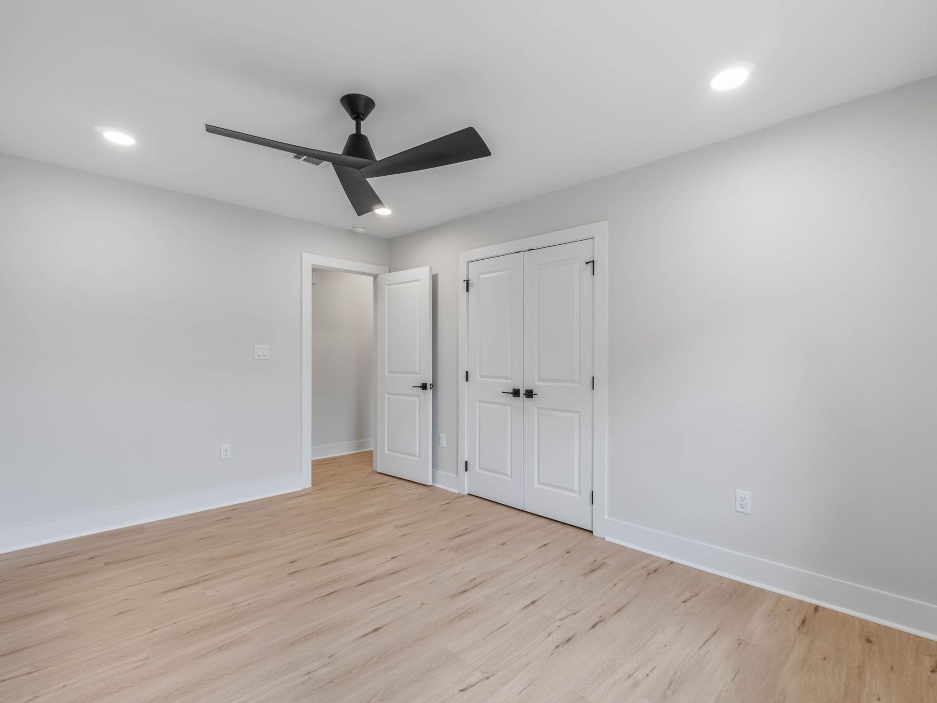 609 Sea View Circle Destin, FL 32541 - Photo 27 of 45 a view of empty room with wooden floor