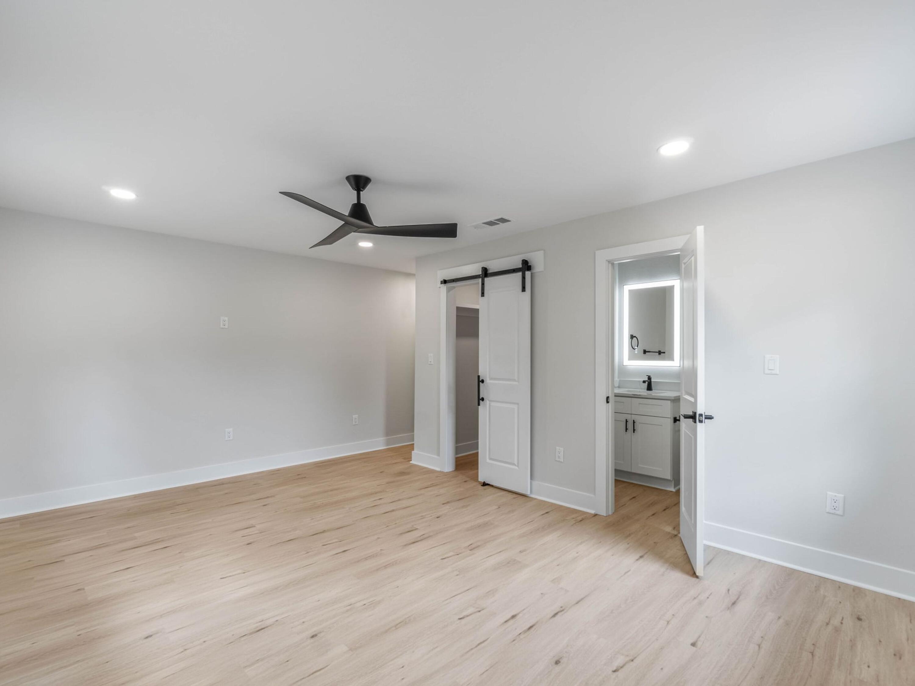 609 Sea View Circle Destin, FL 32541 - Photo 32 of 45 a view of empty room with wooden floor