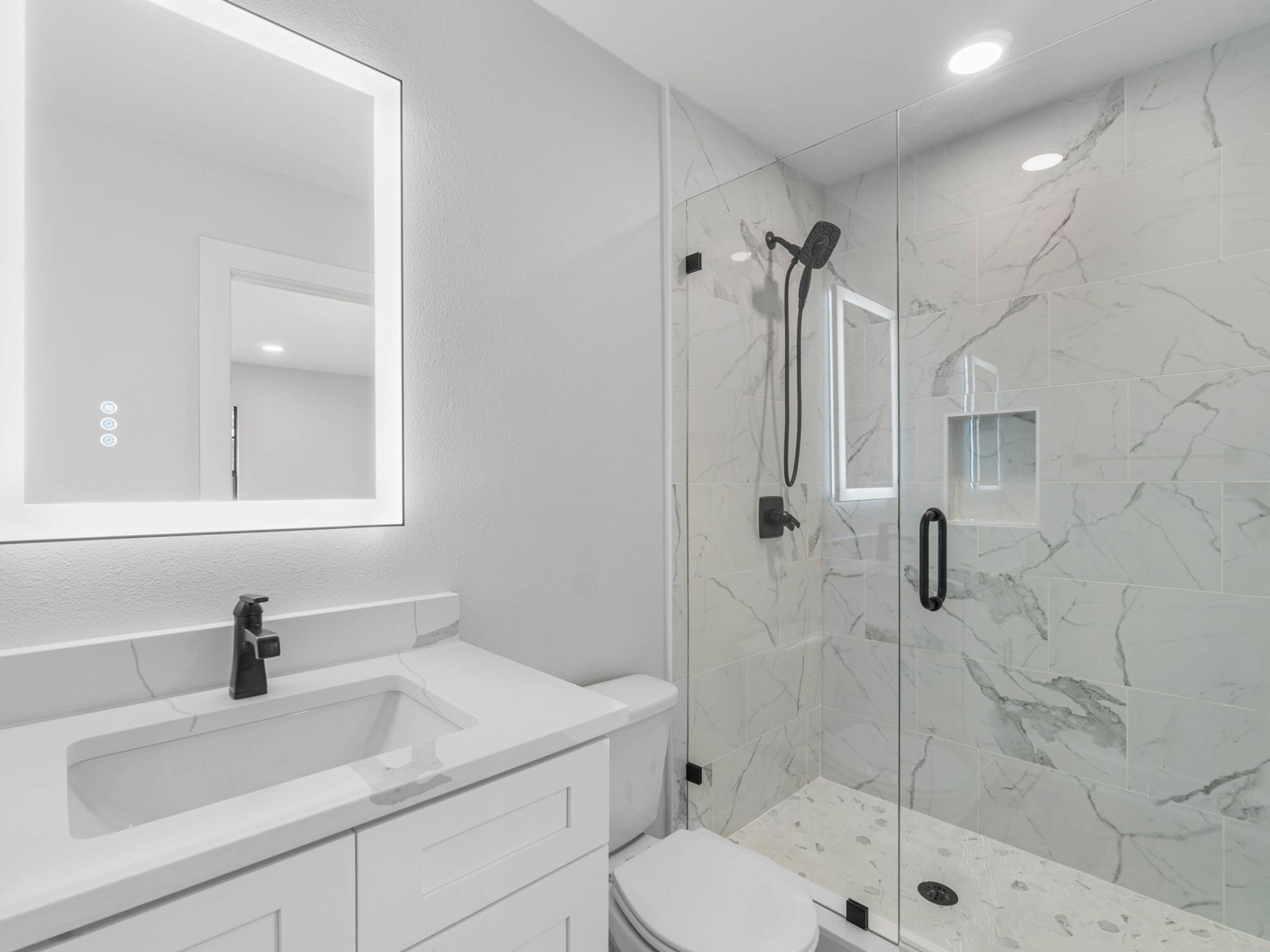 609 Sea View Circle Destin, FL 32541 - Photo 34 of 45 a bathroom with a sink toilet and shower