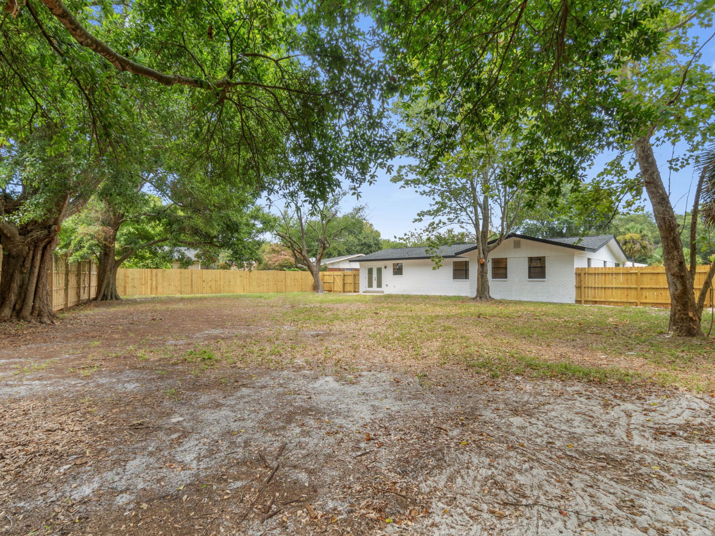 609 Sea View Circle Destin, FL 32541 - Photo 37 of 45 a front view of a house with a yard