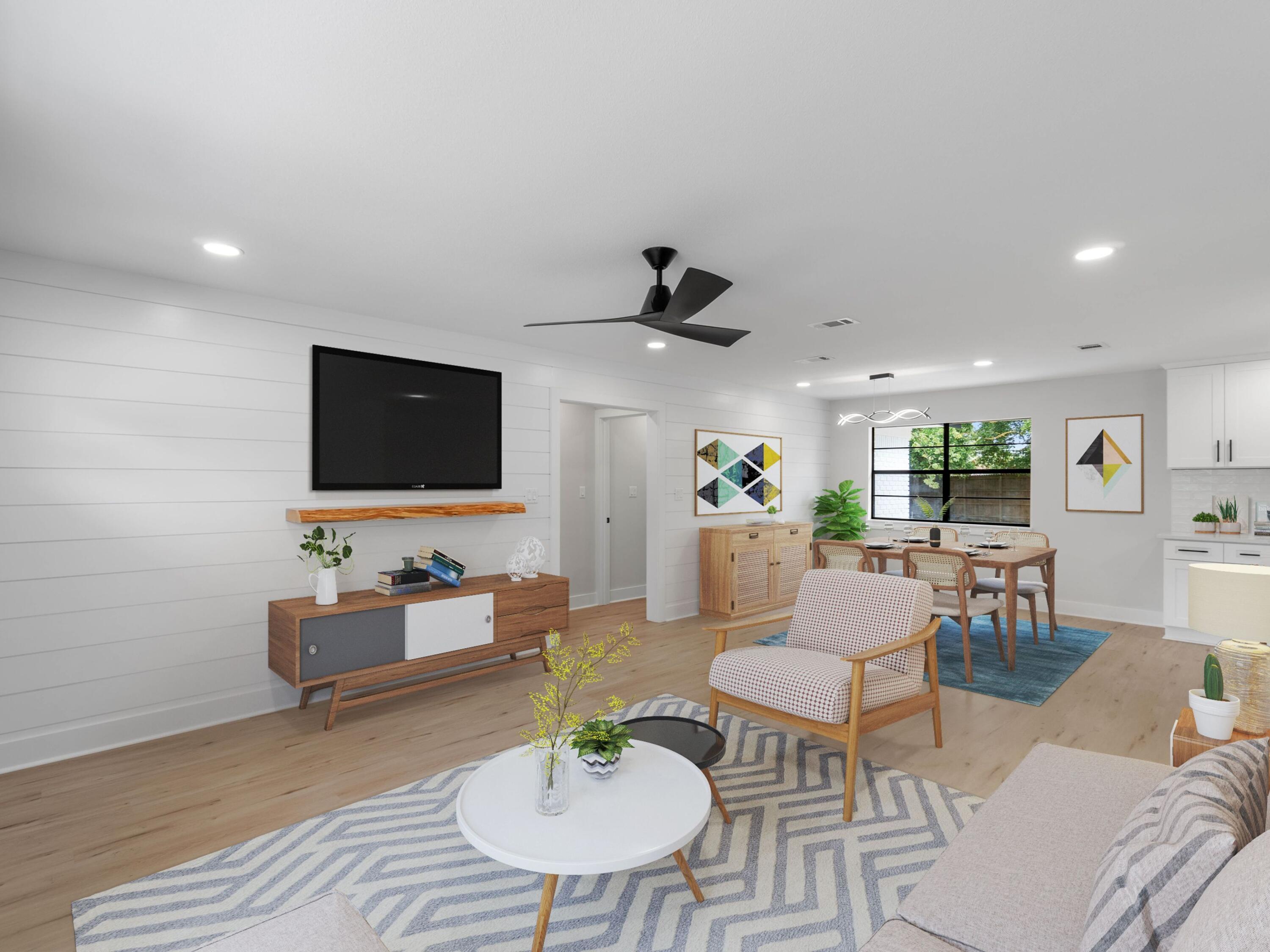 609 Sea View Circle Destin, FL 32541 - Photo 7 of 45 a living room with furniture and a flat screen tv