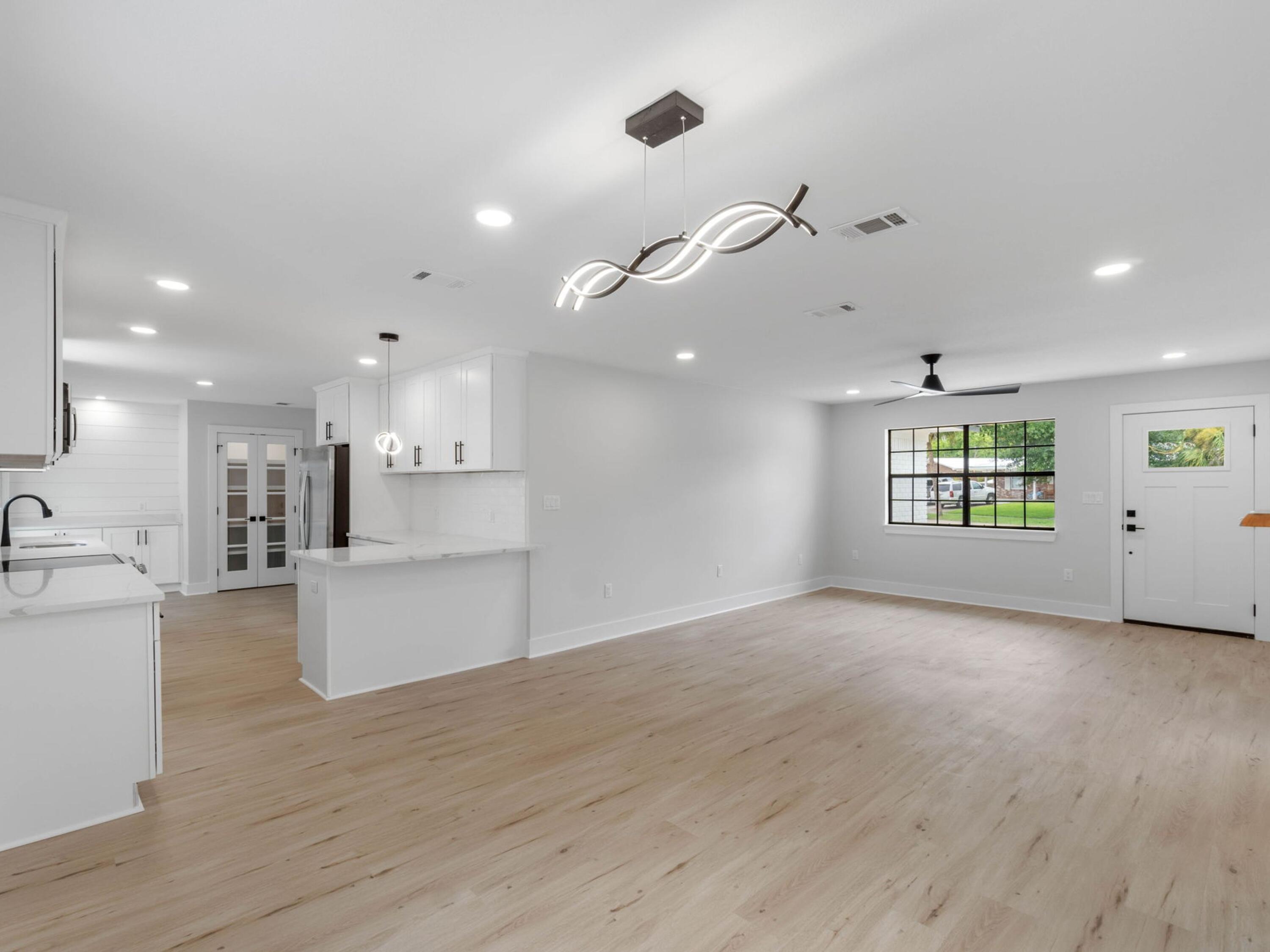 609 Sea View Circle Destin, FL 32541 - Photo 8 of 45 a view of kitchen and windows