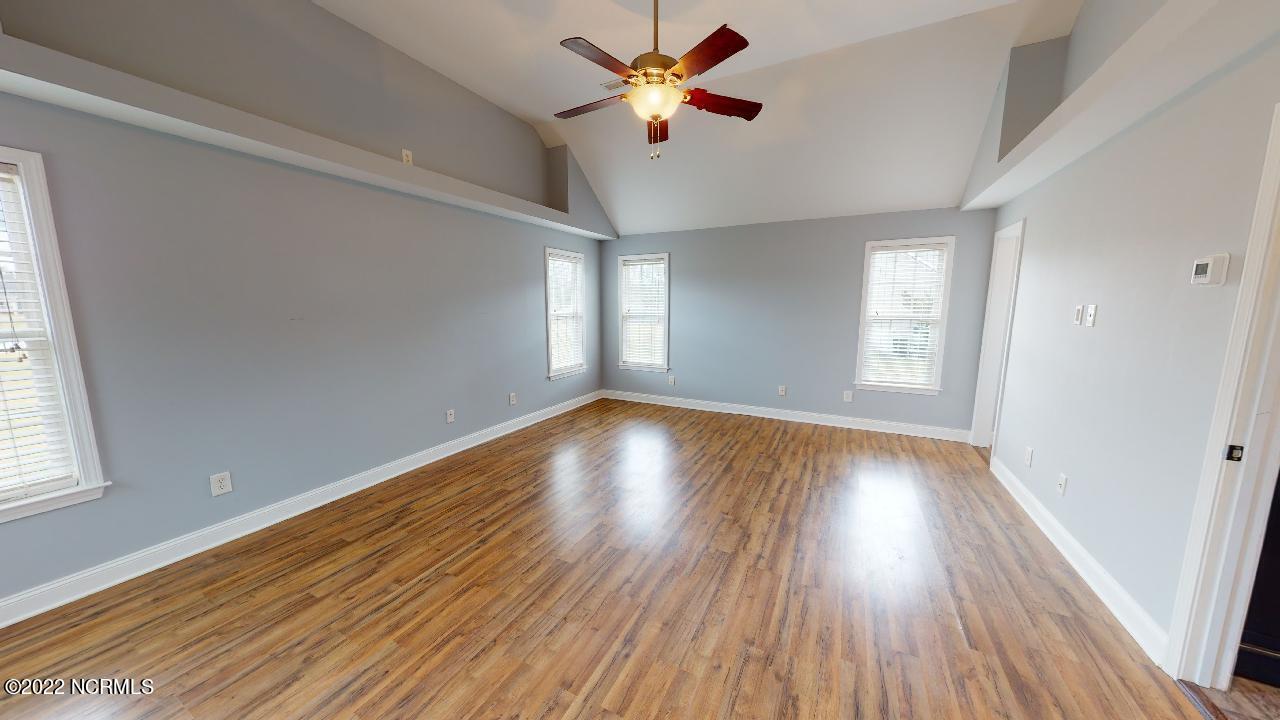 1332 Nine Foot Road Newport, NC 28570 - Photo 14 of 30 master bedroom with vaulted ceiling