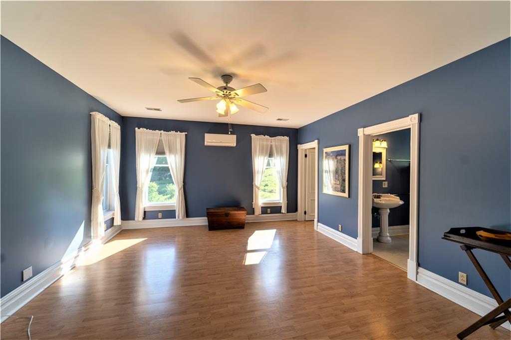 532 Campground Road West Middlesex, PA 16159 - Photo 18 of 25 a view of an empty room with window and wooden floor