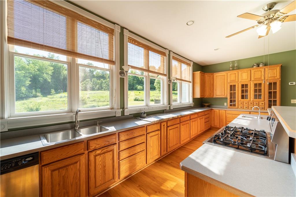 532 Campground Road West Middlesex, PA 16159 - Photo 10 of 25 a large kitchen with stainless steel appliances granite countertop a large window and a sink