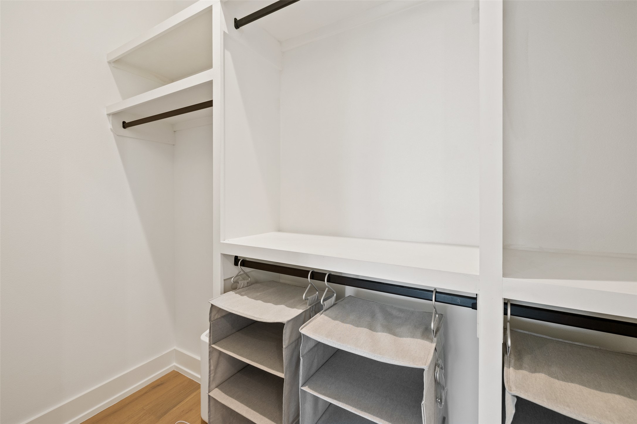 1504 Ruth Avenue, Unit 3 Austin, TX 78757 - Photo 25 of 39 Organized and ready for personal touches, this walk-in closet offers extensive built-in shelving and hanging rods.