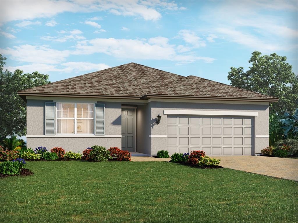 1004 British Circle Daytona Beach, FL 32124 - Photo 1 of 8 front view of a house with a garden