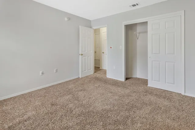 a view of a room that has a window in it