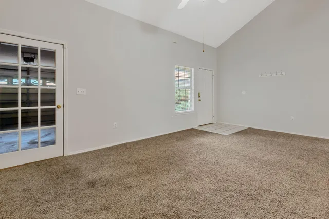 an empty room with windows