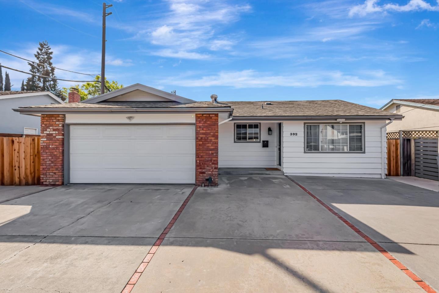 a front view of a house with a garage