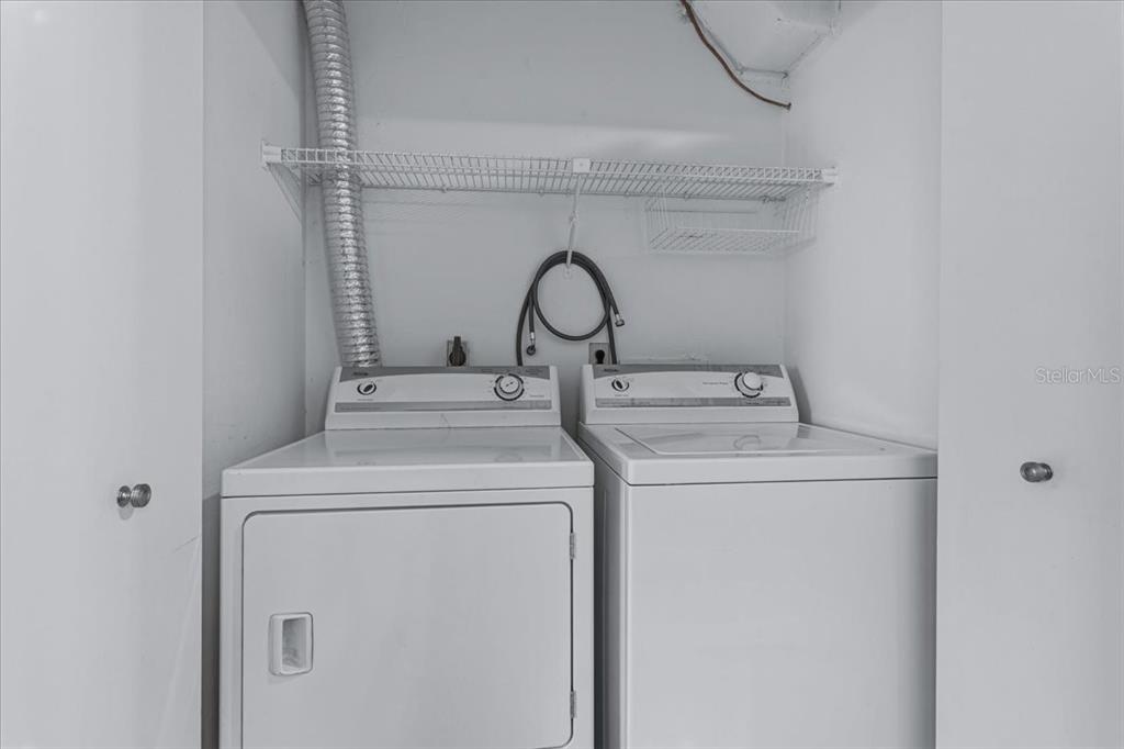 2508 Southwest 35th Place, Unit D19 Gainesville, FL 32608 - Photo 15 of 25 a utility room with dryer and washer