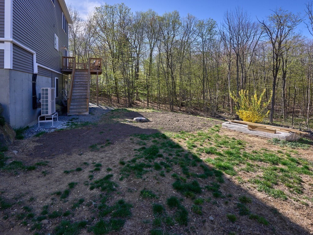 56 Carter Road Westminster, MA 01473 - Photo 31 of 36 a view of a backyard with large trees