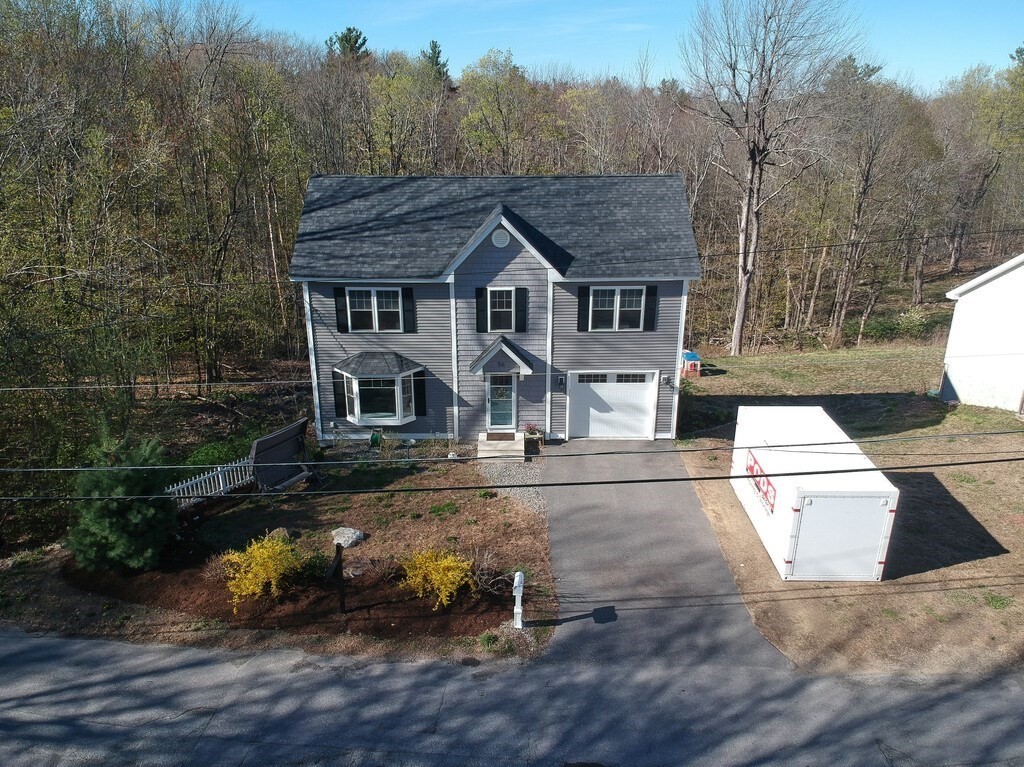 56 Carter Road Westminster, MA 01473 - Photo 33 of 36 an aerial view of a house with a yard