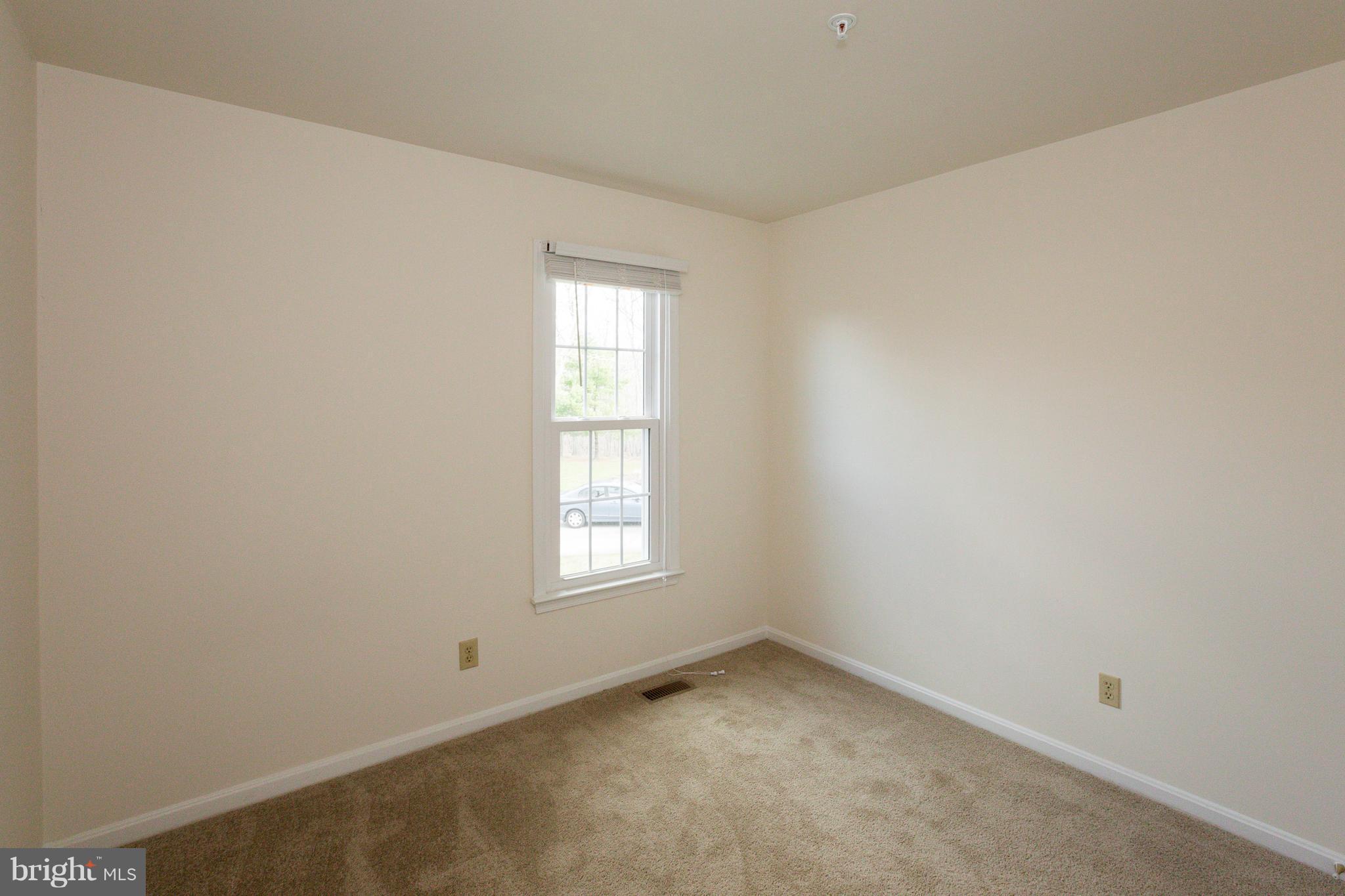 8402 Shadeland Road Laurel, MD 20724 - Photo 21 of 30 an empty room with a window