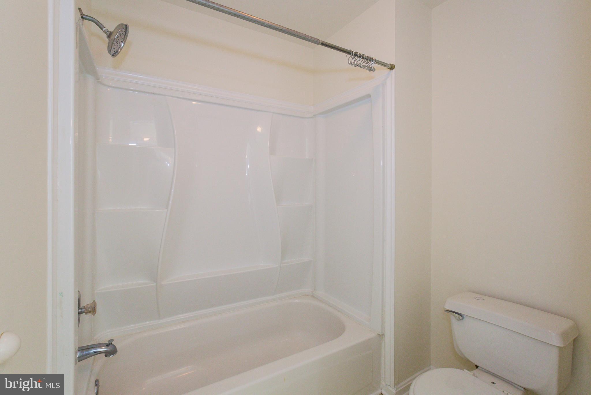 8402 Shadeland Road Laurel, MD 20724 - Photo 23 of 30 a close view of a bathtub in a bathroom