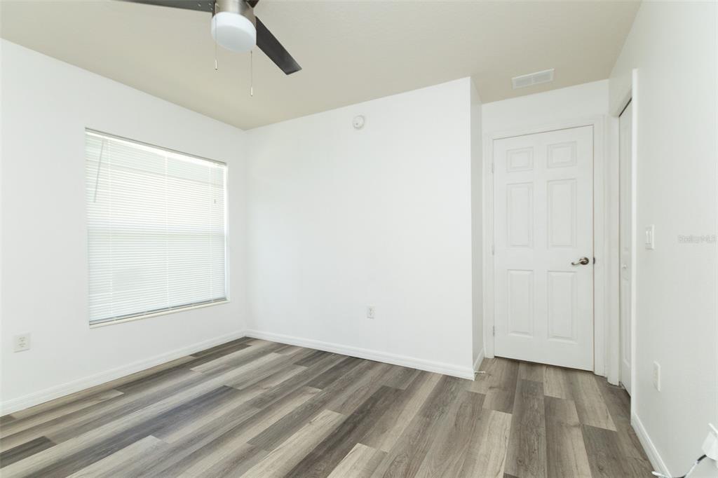 3858 Southwest 161st Street Ocala, FL 34473 - Photo 12 of 67 an empty room with a window