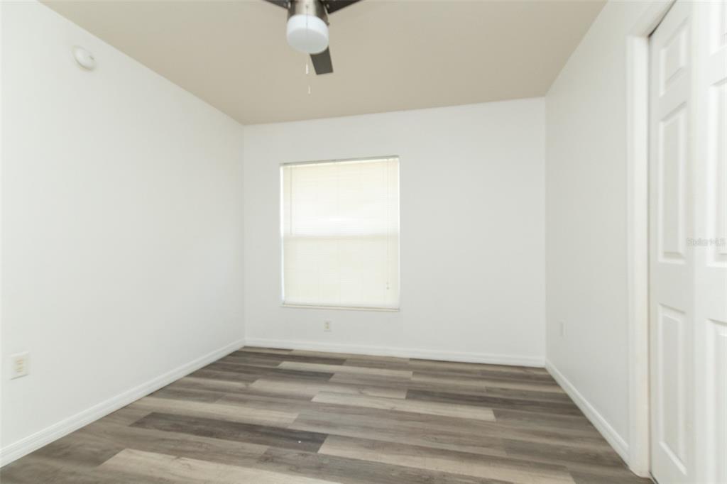 3858 Southwest 161st Street Ocala, FL 34473 - Photo 16 of 67 an empty room with a window