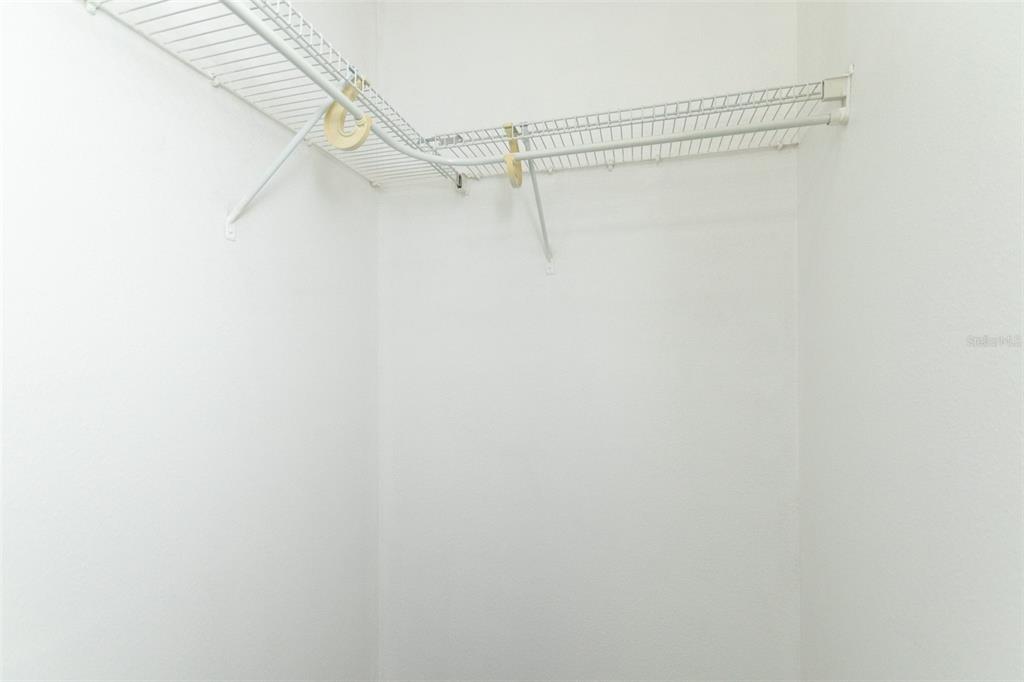 3858 Southwest 161st Street Ocala, FL 34473 - Photo 21 of 67 a view of a room with racks on the wall