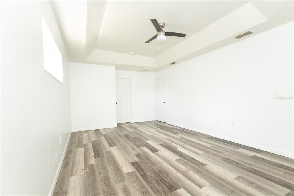 3858 Southwest 161st Street Ocala, FL 34473 - Photo 34 of 67 a view of empty room with wooden floor