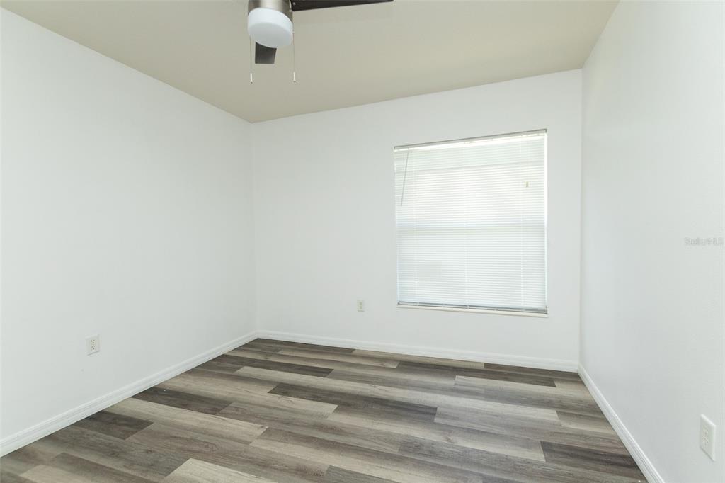 3858 Southwest 161st Street Ocala, FL 34473 - Photo 8 of 67 a view of a room with rack on the wall