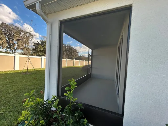 a aerial view of a house with a lake view