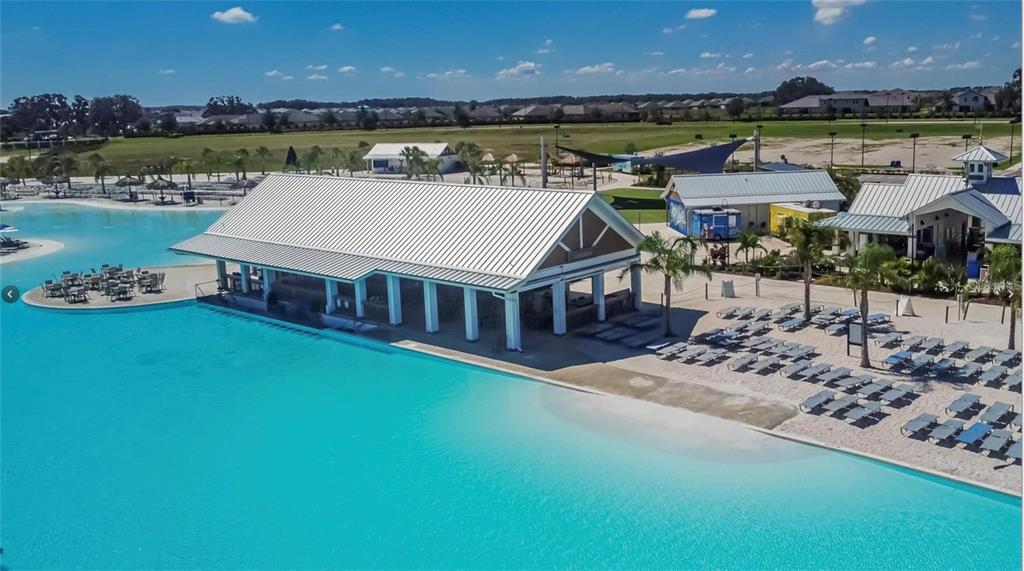 32746 Rustic Rise Road San Antonio, FL 33576 - Photo 22 of 24 a aerial view of a house with a lake view