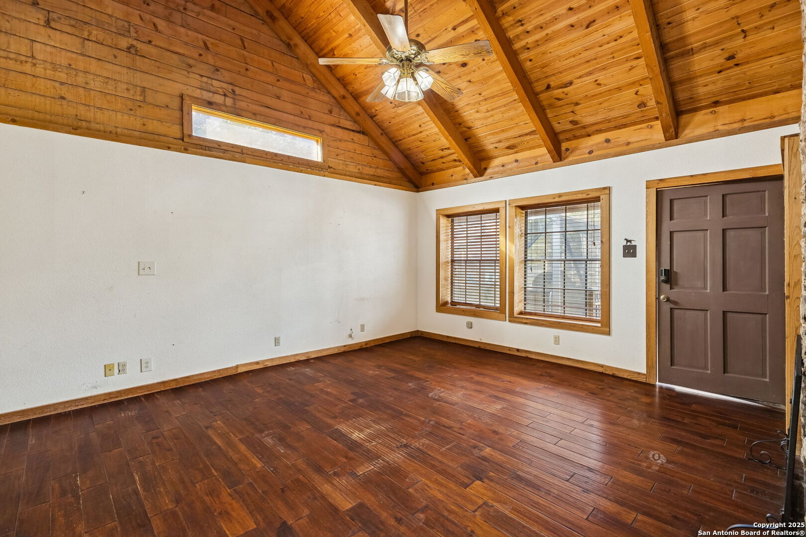 430 Stoney Ridge Bulverde, TX 78163 - Photo 28 of 94 a view of an empty room with wooden floor and a window