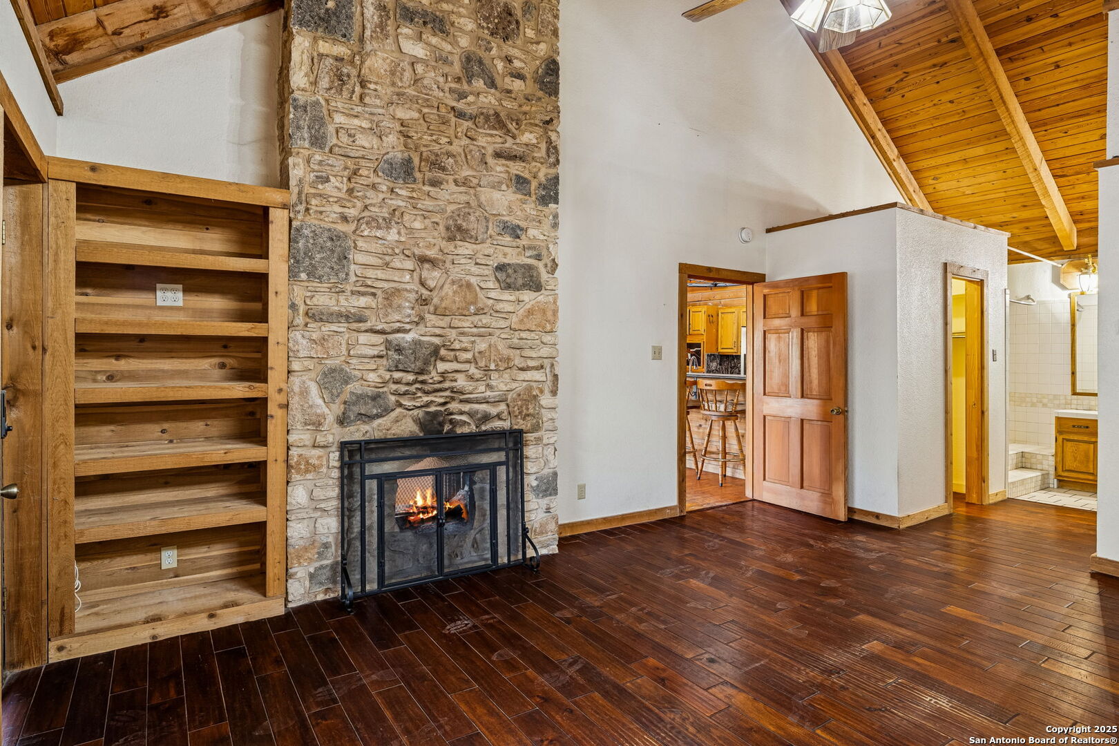 430 Stoney Ridge Bulverde, TX 78163 - Photo 30 of 94 a view of an empty room with wooden floor and a window